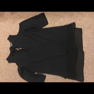 The limited black off the shoulder tank top